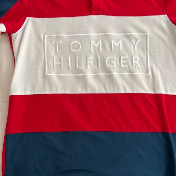 Tommy Hilfiger polo shirt in three colors and is also medium. - Picture 1 of 3